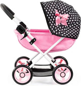 Bayer Design Dolls Pram Cosy pink doll pram side view with black polka dot hood and pink wheels