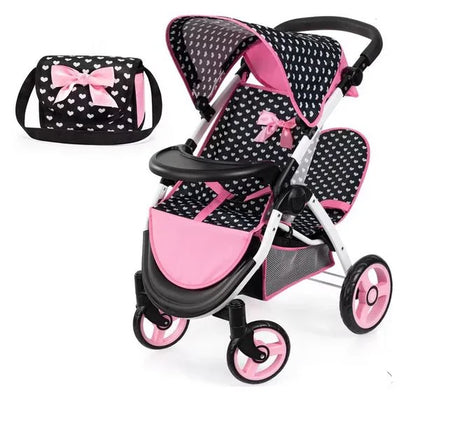 Black and pink heart patterned Bayer Twin Star doll pram with matching bag shown on white background