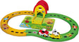 BB Junior farm tractor set showing the full track layout with tractor, yellow trailer, cow and barn