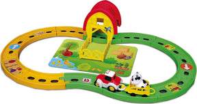 BB Junior farm tractor set showing the full track layout with tractor, yellow trailer, cow and barn