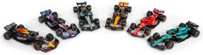 Five Bburago Formula 1 model cars shown loose on a white background