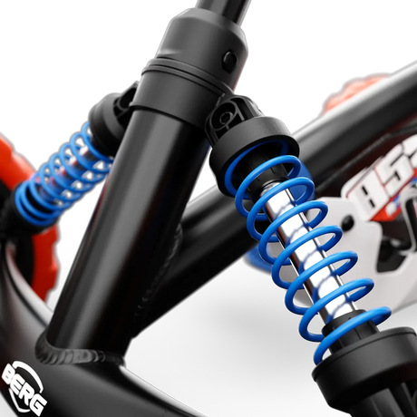 Close-up of blue front springs and black steering column on BERG Buzzy Nitro pedal go-kart