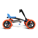 Side view of BERG Buzzy Nitro pedal go-kart with blue seat, black frame and orange wheels