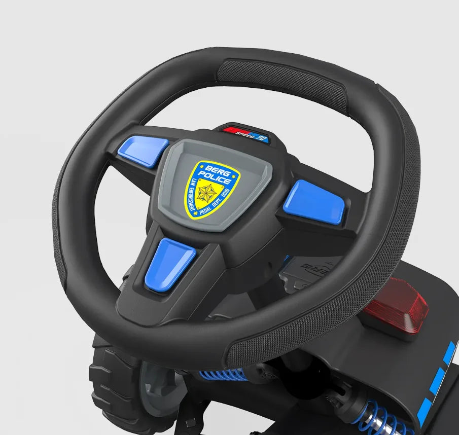 BERG Buzzy Police steering wheel close-up with police badge and buttons – Ireland