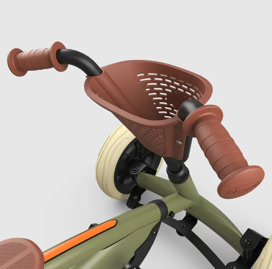 Close-up of BERG Buzzy Retro Green handlebars and basket detail – Ireland