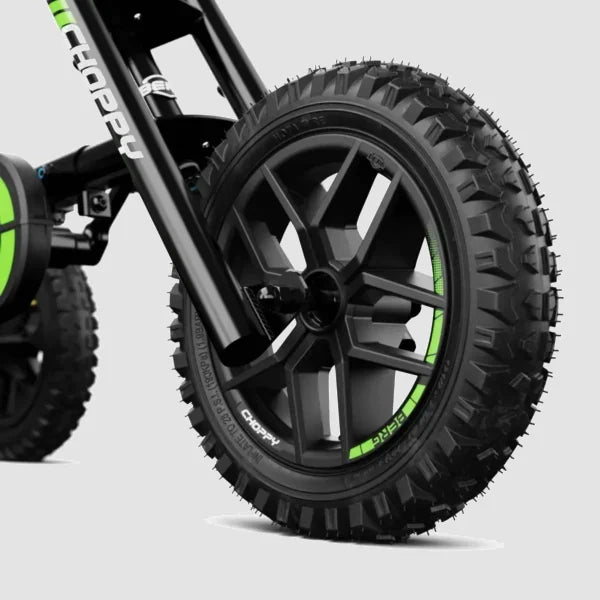 Close-up of BERG Choppy Neo Go-Kart black wheel with knobby tire and green detailing – Ireland