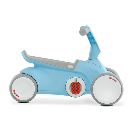 Side view of blue BERG GO² ride-on with grey saddle, grey handlebar and white wheels on a white background
