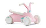 Angled view of pink BERG GO² ride-on with white wheels, white saddle and teal pedal details