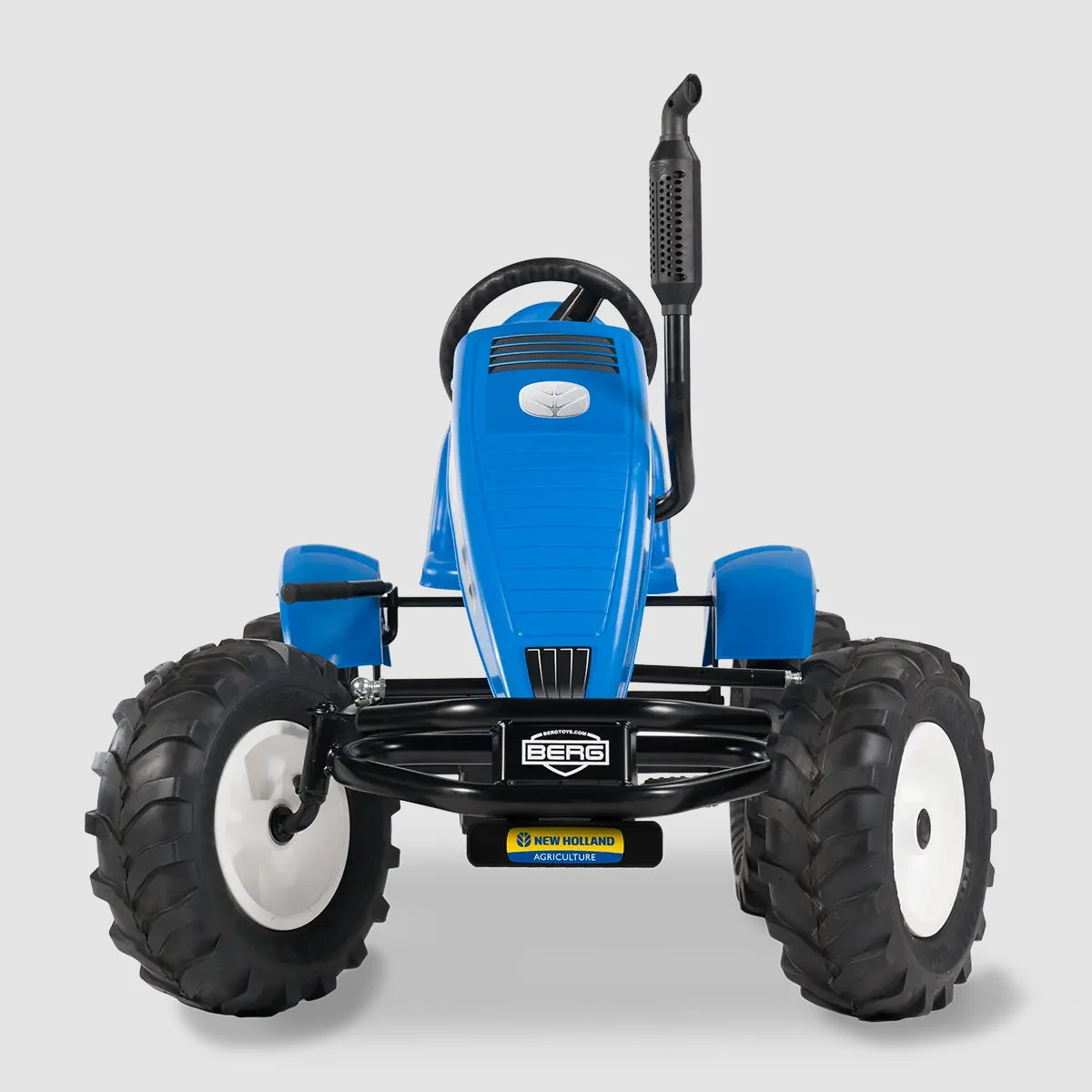 BERG XL New Holland BFR pedal tractor front view showing grill and steering – Ireland