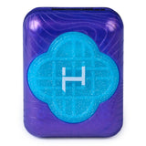 Top view of the closed purple Bitzee KPop Demon Hunters pod, featuring a glittery turquoise Honmoon emblem with a white symbol in the centre.