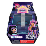 Front of Bitzee KPop Demon Hunters retail packaging featuring the purple electronic pod, HUNTR/X members Rumi, Mira and Zoey, pixel-style characters and Netflix branding.