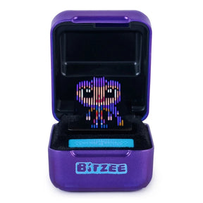 Open purple Bitzee KPop Demon Hunters pod displaying a colourful pixel-style character with large eyes above the turquoise touch control bar.