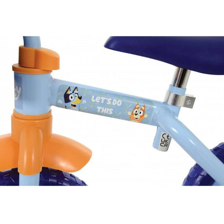 Close up of the Bluey 2 in 1 training bike frame and wheel area