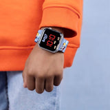 Bluey LED Digital Watch worn on the wrist showing the square case, red LED display and printed blue strap