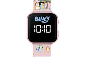 Bluey LED watch front view with Bluey logo, white digital display and pink printed silicone strap featuring Bluey and Bingo characters