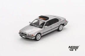 Mini GT James Bond BMW 750IL silver LHD model viewed from the front right showing the BMW kidney grille, headlights, bonnet and roof mounted unit