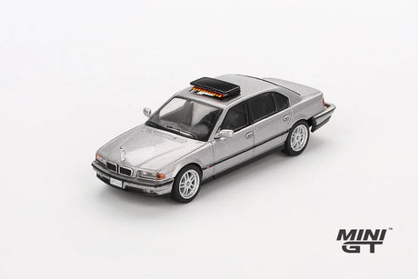 Mini GT James Bond BMW 750IL silver LHD model viewed from the front right showing the BMW kidney grille, headlights, bonnet and roof mounted unit