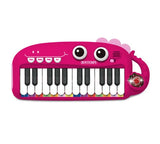 Bontempi pink 24 key electronic keyboard toy with smiling dinosaur design, light effects, and colourful note strip.
