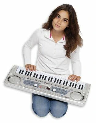 Child kneeling while playing the Bontempi 54 Key Digital Keyboard