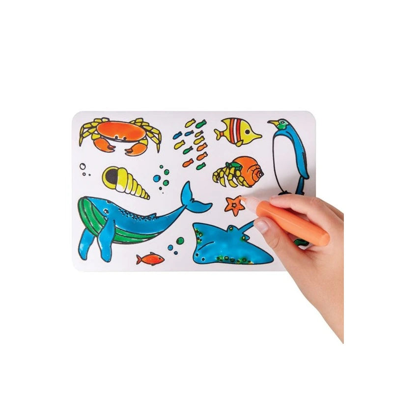 Brainstorm Colour Your Own Stickers Sea Creatures fish, whale, shark and penguin stickers being coloured