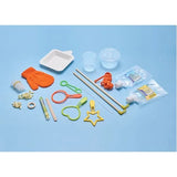 Full contents of Brainstorm Create Crazy Bubbles kit with bubble wands, gloves, rope, solution and tools on blue surface