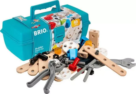 BRIO Builder Starter Set turquoise storage toolbox with wooden building pieces, plastic wheels, nuts, bolts, pliers and spanner arranged in front.