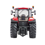 Britains Case Farmall 120 C farm toy tractor shown from the rear with large black tread tyres