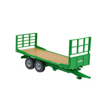 Britains 1:32 Flat Bed Trailer front side view with green racks, twin axles and wood effect bed