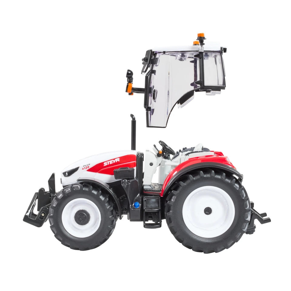 Britains Steyr 4120 Plus farm toy tractor shown side on with white bonnet, red side panel and open cab door