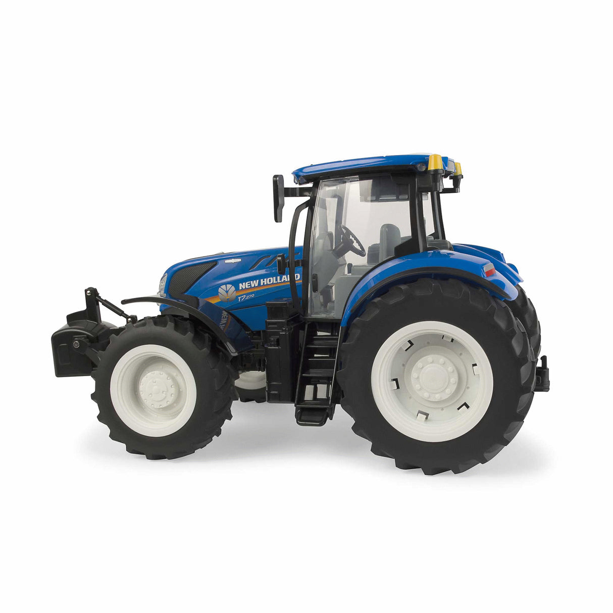 Britains Big Farm New Holland T7.270 tractor toy displayed in a full side view with blue bodywork, transparent cab windows, front mounted weight, rear hitch visible, and oversized treaded tyres with white rims on a white background