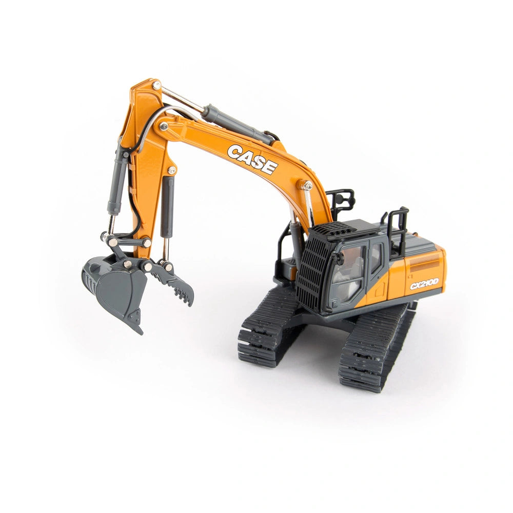 Britains Case CX210D excavator model shown from front angle with boom and bucket raised, tracked base, detailed cab interior visible through windows, handrails and upper structure detailing