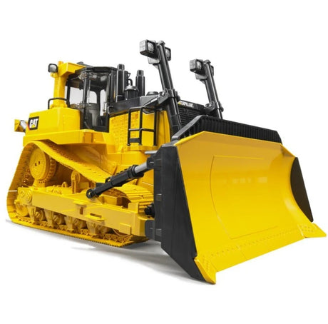 Bruder 1:16 Cat Large Track-Type Tractor shown from the front right with yellow levelling blade