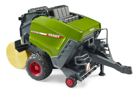 Bruder Fendt Rotana 180V round baler with yellow round bale at the rear