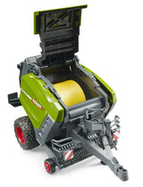 Bruder Fendt Rotana 180V round baler with top section open and yellow round bale inside