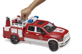Bruder 1:16 RAM 2500 fire engine truck with a hand pressing the grey tank cap on the rear bed