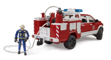 Bruder 1:16 RAM 2500 fire engine truck shown from the rear side with firefighter figure and hose attached