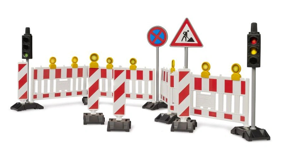 Bruder Traffic Safety Set 62009 displaying four red and white road barriers, warning posts, construction signs and two black traffic lights on a white background
