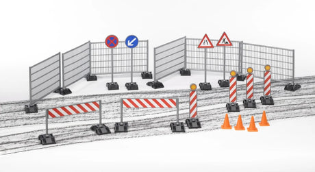 Bruder bWorld construction site accessories including fences, cones and warning signs placed on a road surface