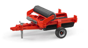 Bruder Cambridge Roller toy in red and black set on a plain white background.