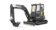Angled view of Bruder Compack Excavator ECR40 showing rubber tracks, lifting blade, and movable bucket arm