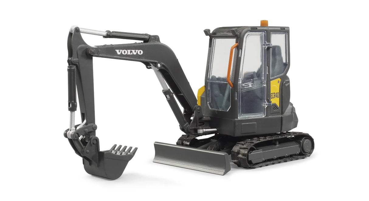 Angled view of Bruder Compack Excavator ECR40 showing rubber tracks, lifting blade, and movable bucket arm