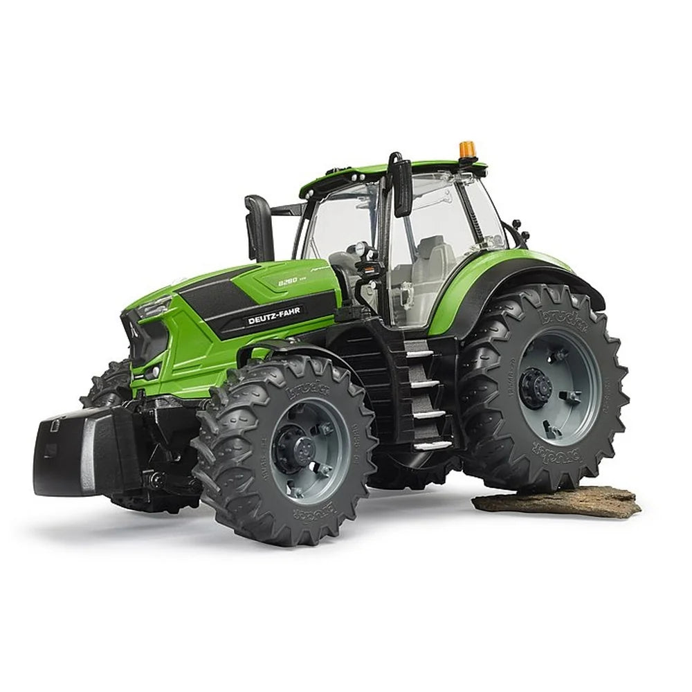 Bruder Deutz-Fahr 8280 TTV Tractor driving over field terrain with tread tyres and bright green body in Ireland