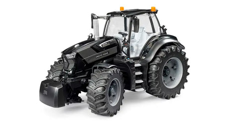 Bruder 1:16 Deutz-Fahr 8280 TTV Warrior black tractor front right view showing Deutz-Fahr bonnet detail, large agricultural tyres and clear glazed cab with orange roof beacons