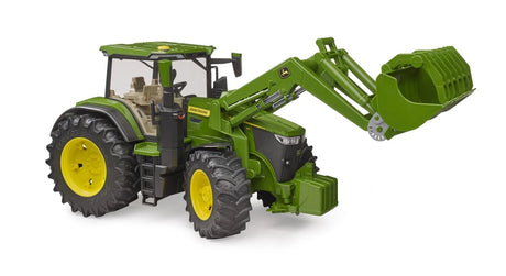 Side view of green John Deere 7R 350 farm toy tractor with raised front loader