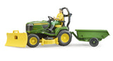 Bruder 1:16 John Deere X949 lawn tractor farm toy side view with figure, trailer and front blade