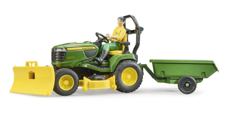 Bruder 1:16 John Deere X949 lawn tractor farm toy side view with figure, trailer and front blade