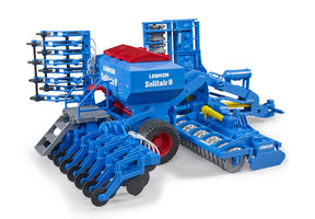 A close view of a blue Lemken Solitair 9 toy seeding machine with folded rear sections and detailed rolling elements.