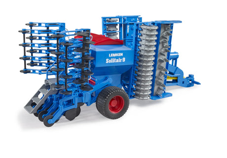 A close view of a blue Lemken Solitair 9 toy seeding machine with both rear assemblies fully folded upright beside the main hopper.