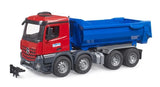 Side view of Bruder Mercedes Benz Arocs Half Pipe Dump Truck showing detailed chassis and blue half pipe bed.