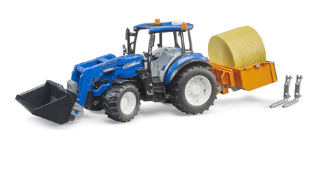 Blue farm toy tractor with front loader, rear bale attachment, forks and round bale